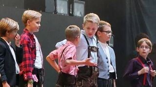 <p>Die "Mini-Gabaliers", ein Chor aus Köln, gehören mit zu den "Einheizern".</p>