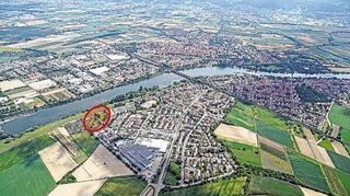 In Neckarhausen Nord könnten ab 2022 in einem ersten Bauabschnitt (rot markiert) Mehrfamilienhäuser mit Sozialwohnungen entstehen.