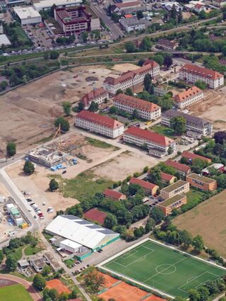 Der Heidelberg Innovation Park im Juni 2020 aus der Luft: Das HEG-Gebäude (dunkelgraues Dach) vorm Umbau.