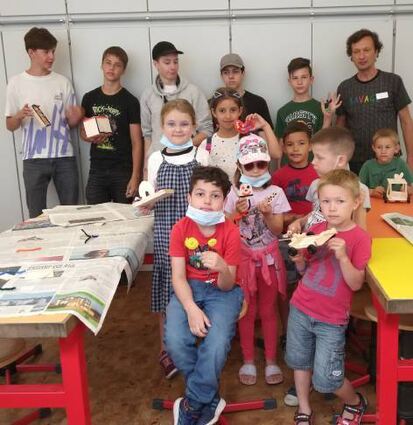 Valentin Demeshko (r.) mit ukrainischen Workshop-Teilnehmenden.