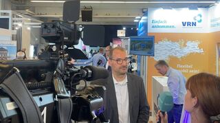 VRN-Geschäftsführer Michael Winnes zieht eine erste Bilanz als Chef: Auf dem Maimarkt stellt sich der Verkehrsverbund den Fragen der Medien.