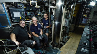 Robert Mrijaj (l-r), Armin Hönig und Matthias Krieg, Mitarbeiter des Technikmuseums Sinsheim, sitzen auf dem Gelände des Technikmuseums Speyer im ausgemusterten U-Boot U17.