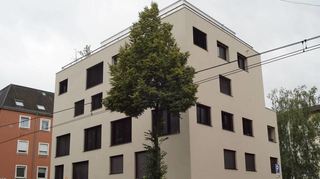 Das Gebäude der Baugemeinschaft meerGlück in der Meerfeldstraße fördert Kooperation und Integration.