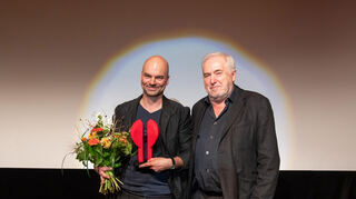 Regisseur Thomas Stuber (l.) mit seinem Laudator Michael Kötz.