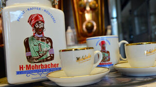 Das in die Kritik geratene alte Logo der Kaffee-Rösterei Mohrbacher.