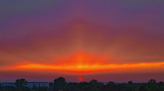 Mit etwas Glück gibt es zum Sundowner noch einen tollen Sonnenuntergang.