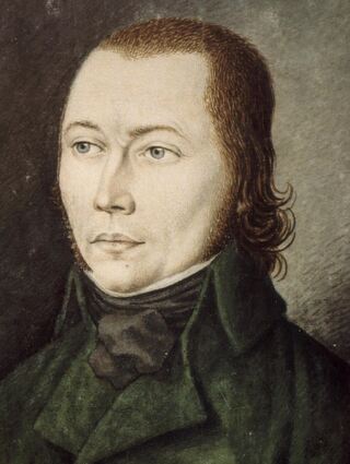 Der „Schinderhannes“, gemalt 1803 vom kurpfälzischen Maler und Grafiker Karl Matthias Ernst. Neue Forschungsergebnisse deuten darauf hin, dass er braune Augen, dunkle Haare und einen eher blassen Hautton hatte.