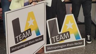 Das Logo des Team Los Angeles der Metropolregion Rhein-Neckar für die Olympischen Spiele 2028.