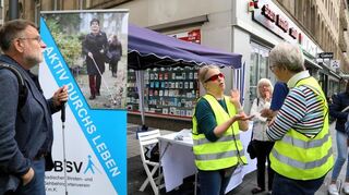 Sehbehinderte beraten auf den Planken in Mannheim über ihre Probleme.